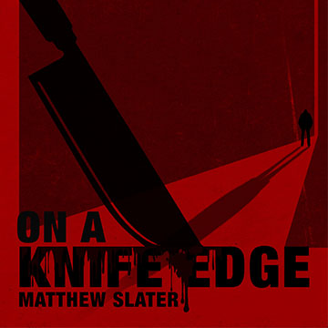 A black knife on a red background